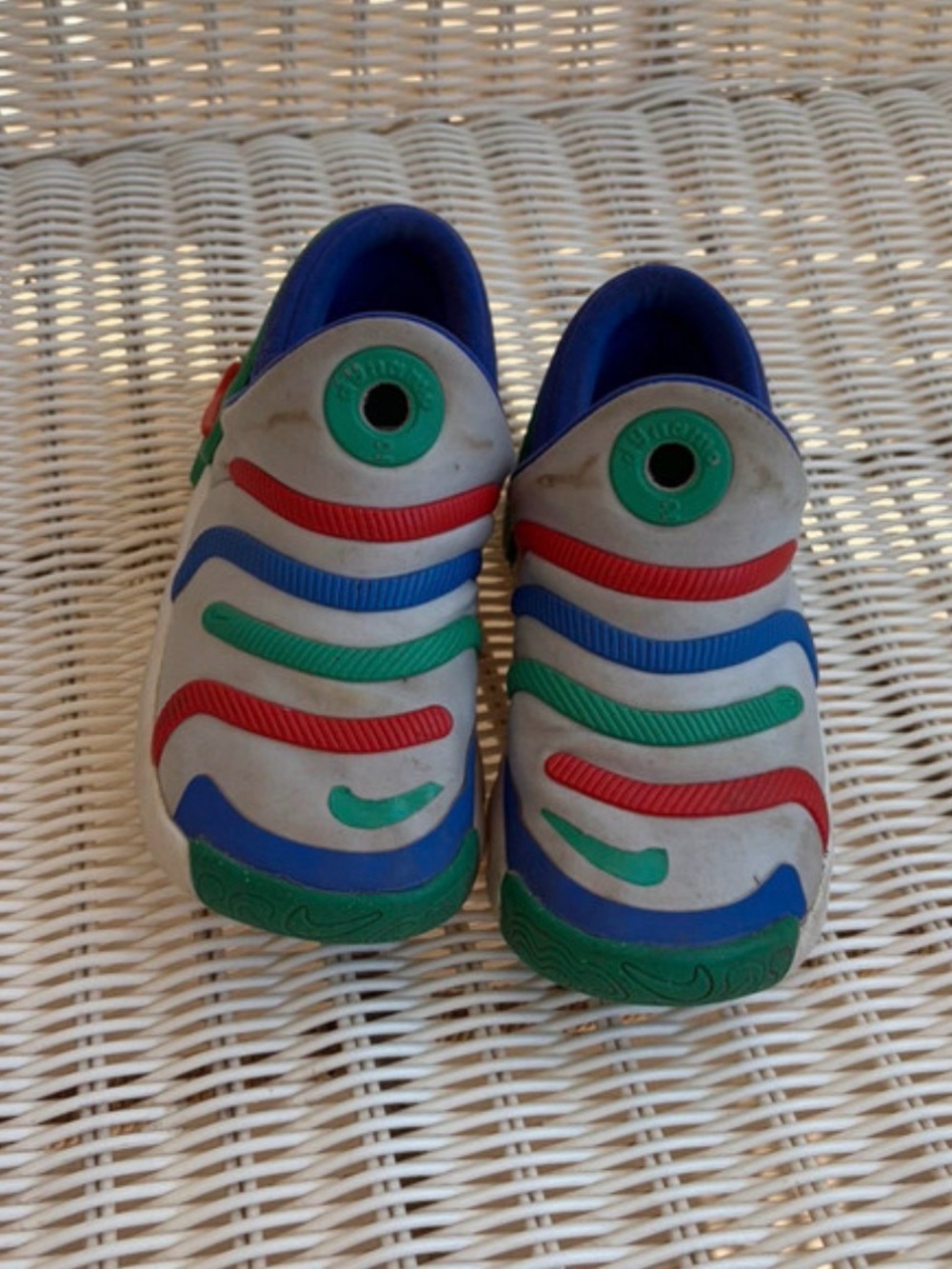 Nike Kids Slip-On Sneakers with Blue, Green & Red Accents